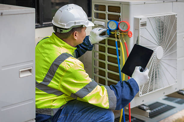 Professional Heat Pump Repair technician working in Diamond Point, NY